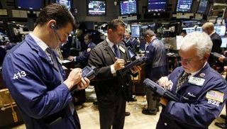Wall-street-trading-specialists-work-on-floor-at-new-york-stock-exchange-moments-before-closing-b